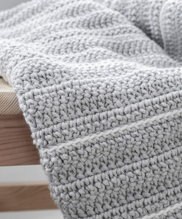 Crochet baby blanket with subtle boho stripes