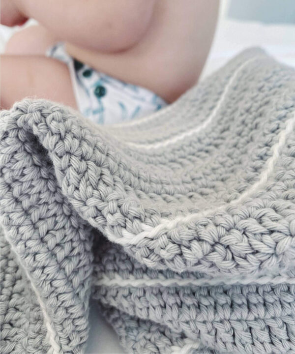 Crochet baby blanket with subtle boho stripes