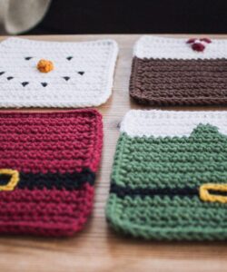 Four cute crochet Christmas coasters